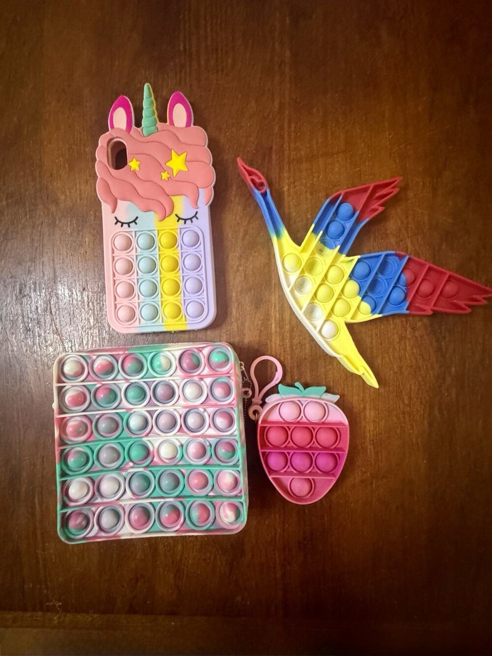 Lot of 4 Sensory Fidget Pop Toys Unicorn Phone Case Strawberry Coin Purse Bird